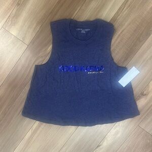 Spiritual gangster, muscle, tank top size medium. Says “good karma”